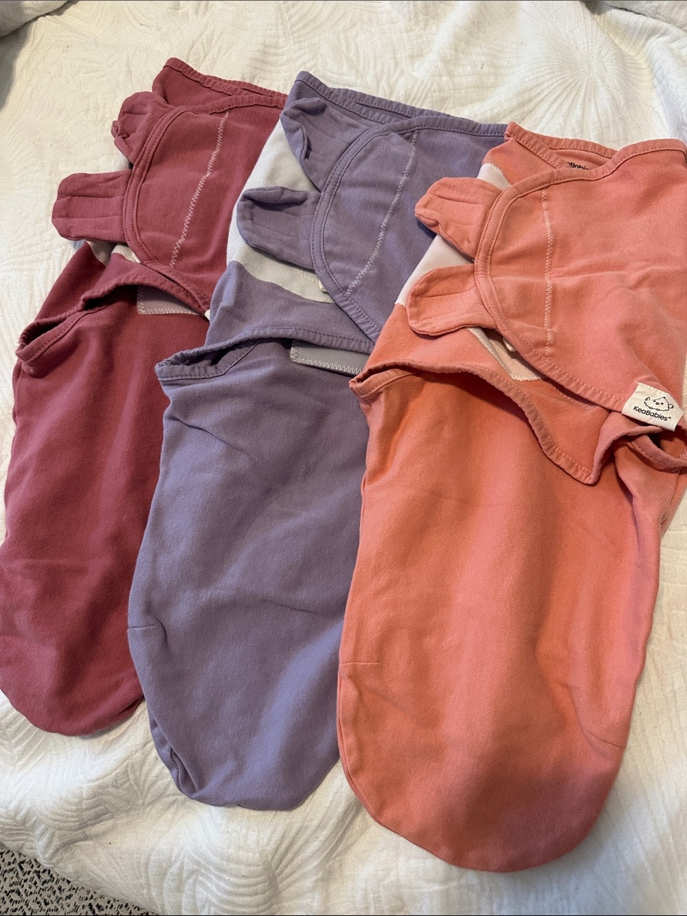 KeaBabies 3-Pack Cotton Swaddle Sleep Sacks in Rose, Mauve, and Dusty Coral 0-3M